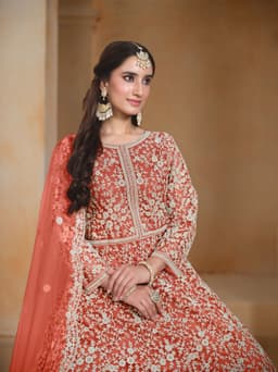 Stylish red anarkali suit party wear with heavy embroidery, traditional Indian fashion, and wedding wear look