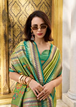 Pista Green Tissue Silk Saree with Teal Zari Border