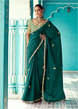 Emerald Green Organza Saree with Signature Zari Embellishment