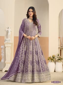 Purple embroidered anarkali suit party wear for women with elegant ethnic design and festive traditional style