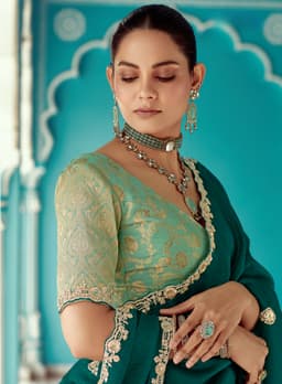 Emerald Green Organza Saree with Signature Zari Embellishment
