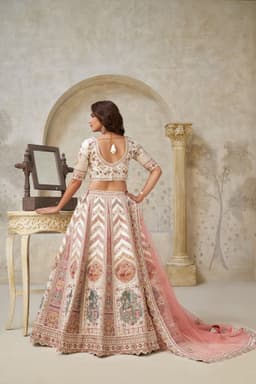 Luxury Ivory Silk Bridal Lehenga with Paisley Embroidery