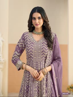 Designer anarkali suit party wear with detailed embroidery, stylish dupatta, and premium wedding fashion look