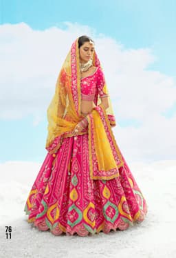 Rani Pink Bridal Lehenga with Yellow Dupatta and Heavy Embroidery Work