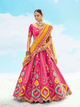 Rani Pink Bridal Lehenga with Yellow Dupatta and Heavy Embroidery Work