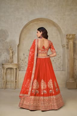 Rust Silk Embroidered Lehenga Choli with Elephant Motifs
