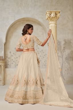 Cream Silk Embellished Lehenga Choli with Gold Work