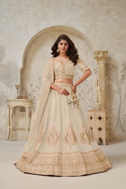 Cream Silk Embellished Lehenga Choli with Gold Work