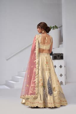 Cream Silk Lehenga Choli with Handcrafted Art Motifs