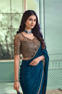 Teal Blue Designer Georgette Saree with Embellished Border
