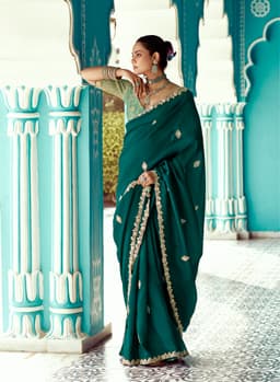 Emerald Green Organza Saree with Signature Zari Embellishment